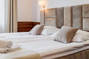 Posteľ alebo postele v izbe v ubytovaní Hotel Cristal Park