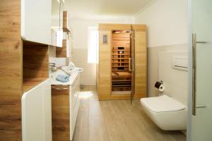Koupelna v ubytování Ferienhaus Auszeit + 27 fotografií
