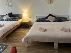 Postel nebo postele na pokoji v ubytování Apartmany Star