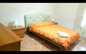 En eller flere senge i et værelse på Affittacamere SantaMaria