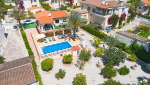 an aerial view of a house with a swimming pool at Villa Cohete - Plusholidays in Ifach