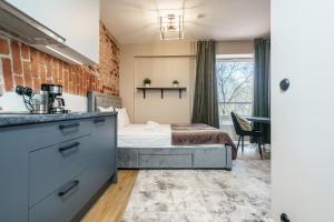 Postel nebo postele na pokoji v ubytování Dreamstay Avangard - shared Roof Terrace, High speed Wifi 200 Mbps & Gym