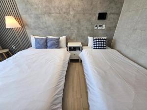 Postel nebo postele na pokoji v ubytování 라비앙즈-Raviens-Elliy's Room