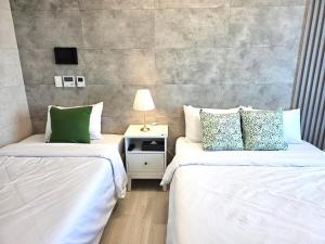 Postel nebo postele na pokoji v ubytování 라비앙즈-Raviens-Elliy's Room
