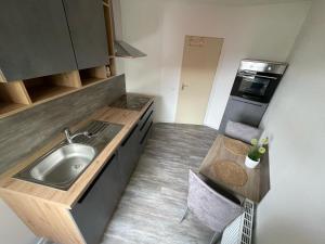 Kuchyň nebo kuchyňský kout v ubytování Ferienwohnung Am Waldesrand