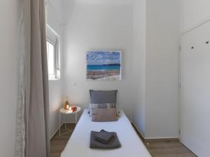 Posteľ alebo postele v izbe v ubytovaní Beautiful Athenian apartment with terrace