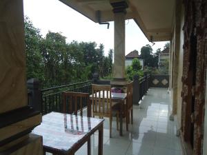 Ein Balkon oder eine Terrasse in der Unterkunft Kenari House