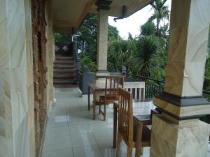 Ein Balkon oder eine Terrasse in der Unterkunft Kenari House