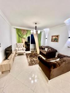 Гостиная зона в Gardenia city apartments - 57051