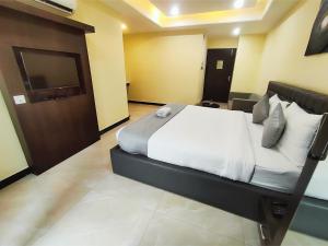 Postel nebo postele na pokoji v ubytování HOTEL PAPILIO