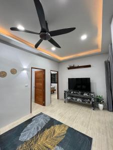 Μια τηλεόραση ή/και κέντρο ψυχαγωγίας στο Private Pool Residences