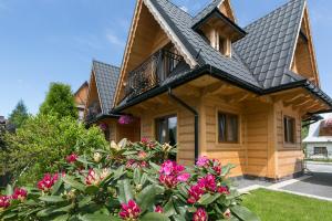 Vonkajšia záhrada v ubytovaní Domek Deluxe Resort Willa Adrian