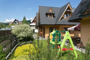 Vonkajšia záhrada v ubytovaní Domek Deluxe Resort Willa Adrian
