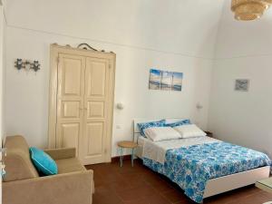 Postel nebo postele na pokoji v ubytování Casa Chicchella- Authentic Experience