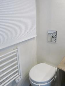 Kylpyhuone majoituspaikassa Apartment Saintonge CityCosy