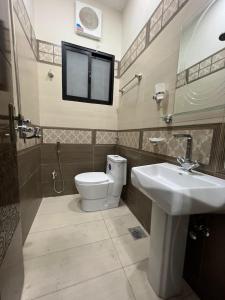 Koupelna v ubytování Premium Apartments