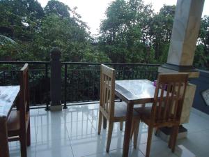 Ein Balkon oder eine Terrasse in der Unterkunft Kenari House