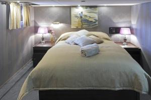 Ein Bett oder Betten in einem Zimmer der Unterkunft Sanssouci Star