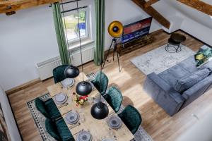 Posezení v ubytování UNiQE I 115qm I 3 Schlafzimmer I Nähe Messe