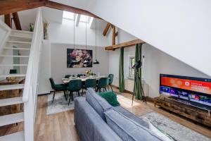 TV a/nebo společenská místnost v ubytování UNiQE I 115qm I 3 Schlafzimmer I Nähe Messe + 37 fotografií