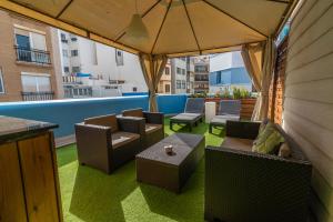 Posezení v ubytování Costa Lairaga Suite junto a Canteras