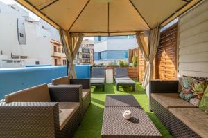 Posezení v ubytování Costa Lairaga Suite junto a Canteras