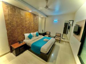 Postel nebo postele na pokoji v ubytování Hotel Delhi Pride, Karol Bagh