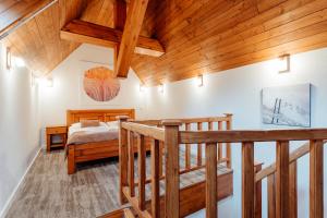 Letto o letti in una camera di Hotel Mikulášska Chata