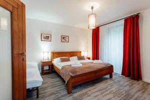 Letto o letti in una camera di Hotel Mikulášska Chata