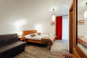 Letto o letti in una camera di Hotel Mikulášska Chata