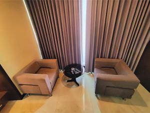 Posezení v ubytování HOTEL PAPILIO