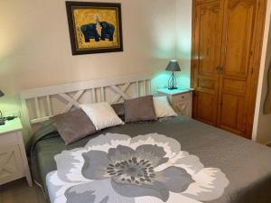 Łóżko lub łóżka w pokoju w obiekcie Villa Alexandra Calpe