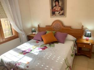 Łóżko lub łóżka w pokoju w obiekcie Villa Alexandra Calpe