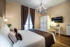 Postel nebo postele na pokoji v ubytování La Corte di Ripoli