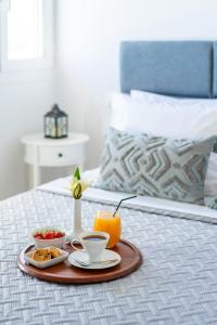 Postel nebo postele na pokoji v ubytování Plumeria Apartment Sitia