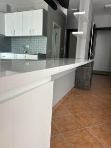 Kuchyň nebo kuchyňský kout v ubytování Apartament Raci + 37 fotografií