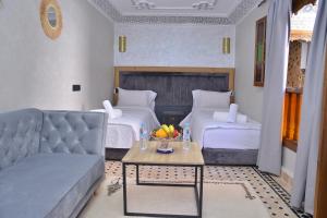 Posezení v ubytování Riad Diamant Bleu
