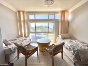 Χώρος καθιστικού στο Umdloti Holiday Resort +23 φωτογραφίες