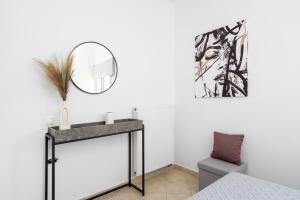 Postel nebo postele na pokoji v ubytování Plumeria Apartment Sitia