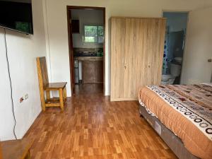 Postel nebo postele na pokoji v ubytování Mania Santos Family Apartment