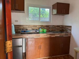 Kuchyň nebo kuchyňský kout v ubytování Mania Santos Family Apartment