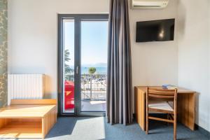 A television and/or entertainment centre at Hotel Al Castello