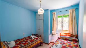 Postel nebo postele na pokoji v ubytování Casa Victoria Alozaina by Ruralidays + 13 fotografií