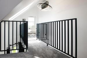Ένα ή περισσότερα κρεβάτια σε δωμάτιο στο AH Apartamenty - Jezioro