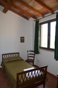 Letto o letti in una camera di Agriturismo Poggialberi