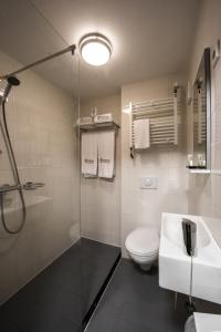 Vonios kambarys apgyvendinimo įstaigoje Hotel-Restaurant Unicum Elzenhagen
