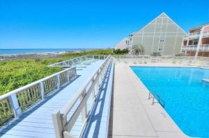Πισίνα στο ή κοντά στο Oak Island Beach Villa 406-The Turtle Nest