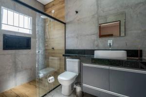 Koupelna v ubytování Chácara charmosa + 9 fotografií