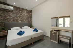 Voodi või voodid majutusasutuse Pyrgi house, Ipsos Corfu toas
