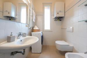 Ένα μπάνιο στο Casa Roberto - Centrale vista porto Carlo Riva +15 φωτογραφίες